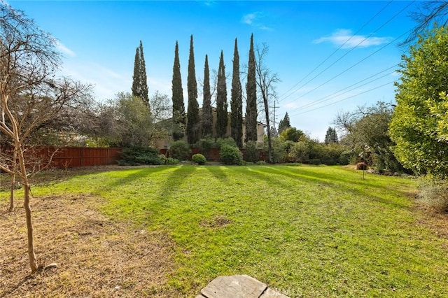 view of yard with fence