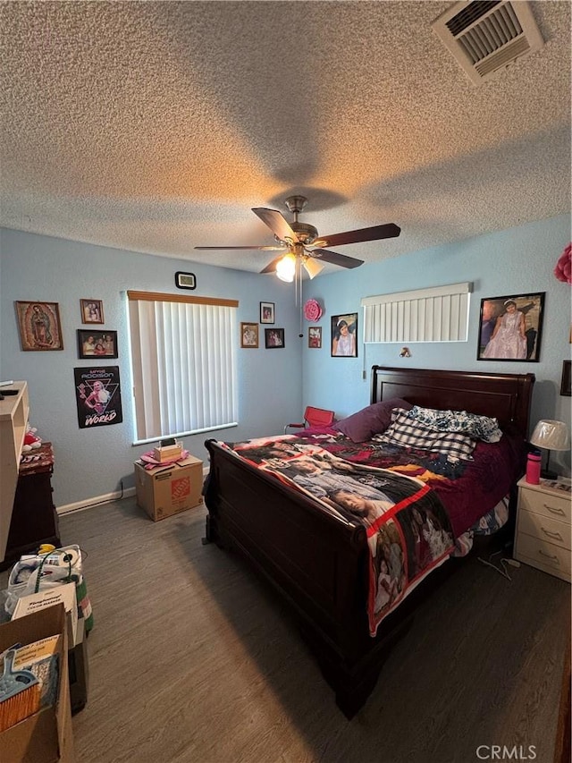 7687 Chase Ave, Hesperia, CA 92345 - bedroom featuring visible vents, wood finished floors, ceiling fan, and a textured ceiling