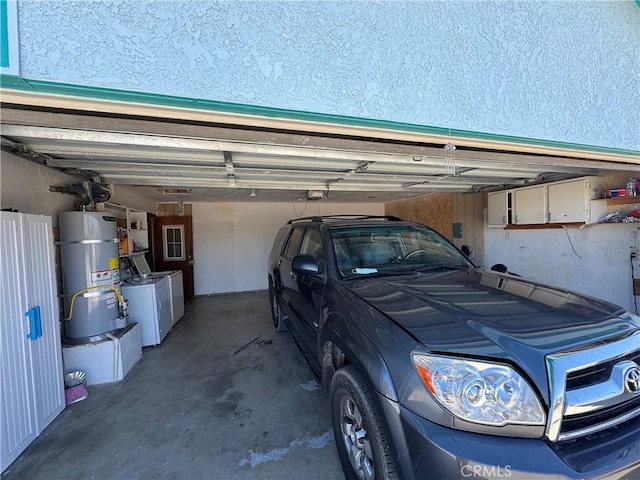 7687 Chase Ave, Hesperia, CA 92345 - garage featuring secured water heater and washing machine and dryer