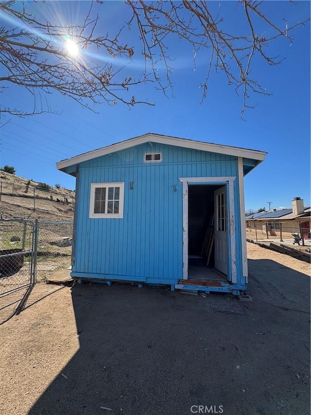 7687 Chase Ave, Hesperia, CA 92345 - view of outbuilding featuring fence and an outbuilding