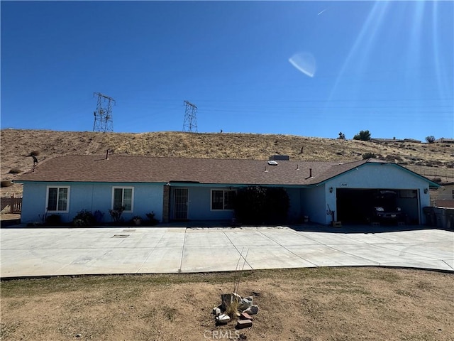 7687 Chase Ave, Hesperia, CA 92345 - single story home featuring driveway and a garage