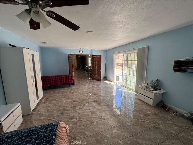 7687 Chase Ave, Hesperia, CA 92345 - unfurnished bedroom with a textured ceiling, ceiling fan, visible vents, and marble finish floor