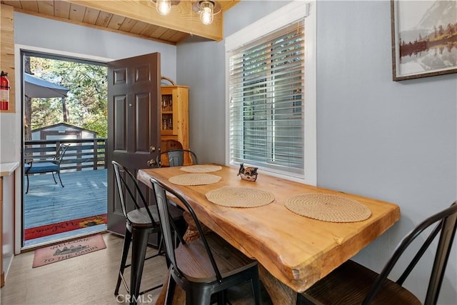 dining space featuring wood finished floors