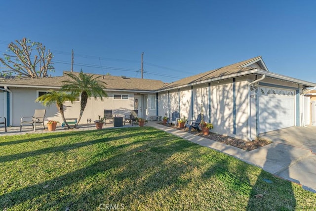 ranch-style home with a garage, driveway, a front lawn, and stucco siding