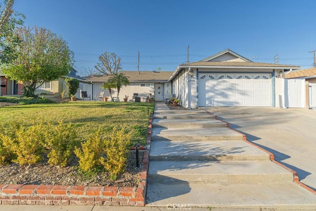 ranch-style house featuring a garage, concrete driveway, a front lawn, and stucco siding