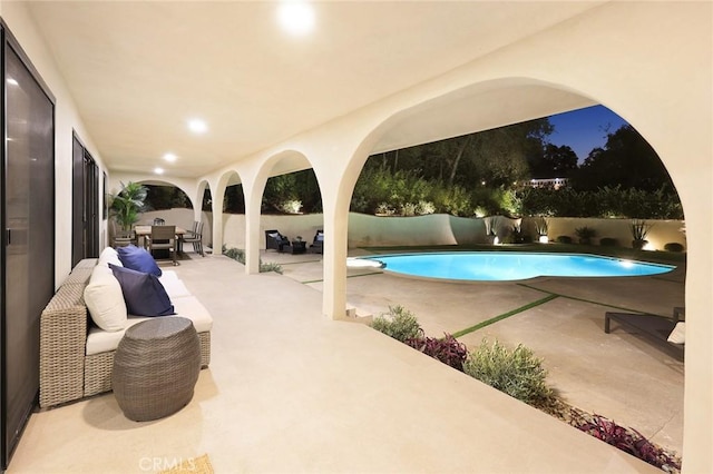 view of pool with a fenced in pool, an outdoor living space, a patio area, and a fenced backyard