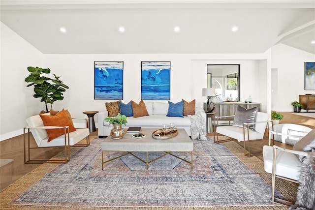 living room with lofted ceiling, baseboards, and recessed lighting