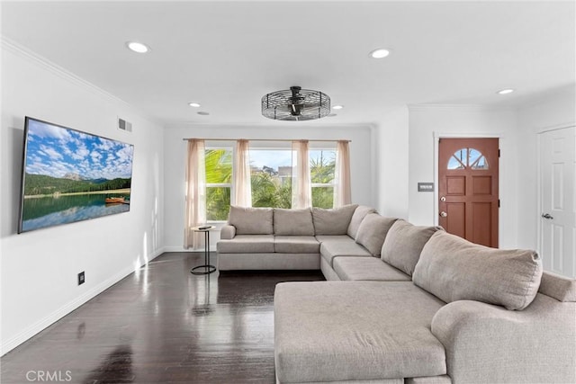 living room with baseboards, visible vents, dark wood-style floors, crown molding, and recessed lighting