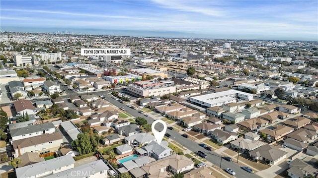 drone / aerial view with a view of city