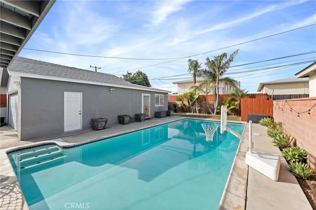 view of pool with a fenced backyard and a fenced in pool