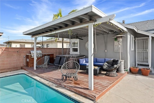 exterior space with a fenced in pool, a hot tub, fence, an outdoor living space, and a wooden deck