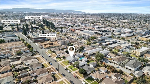 aerial view featuring a residential view and a mountain view