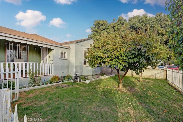 view of yard with fence