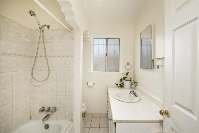 full bathroom with  shower combination, tile patterned flooring, vanity, and toilet