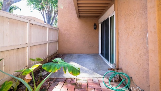 view of patio with fence