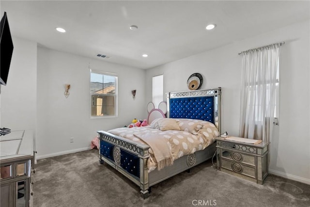 bedroom with baseboards, visible vents, dark colored carpet, and recessed lighting