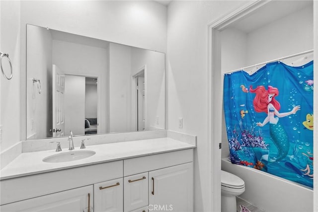 bathroom with toilet, shower / bath combo with shower curtain, and vanity