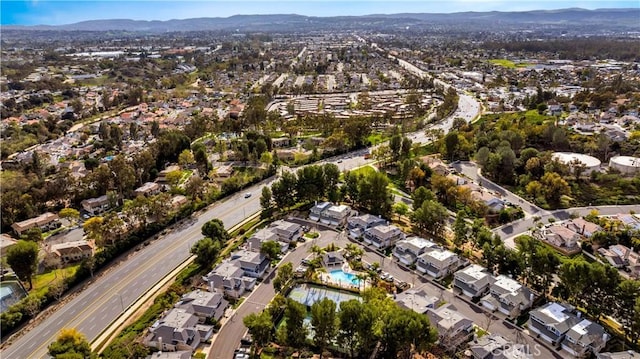 bird's eye view featuring a residential view and a mountain view