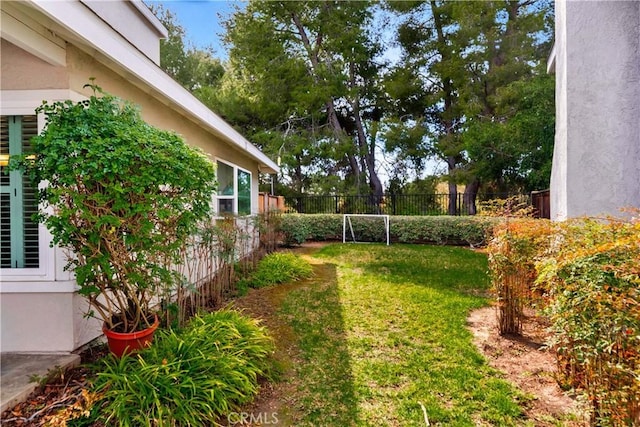 view of yard with fence