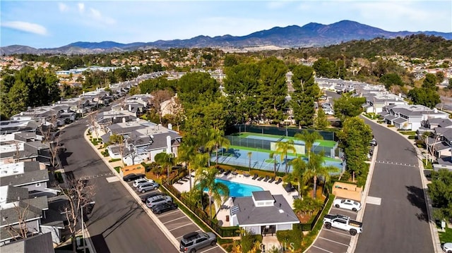 birds eye view of property with a residential view and a mountain view