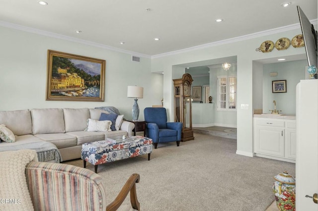 living area featuring crown molding, recessed lighting, visible vents, and light colored carpet