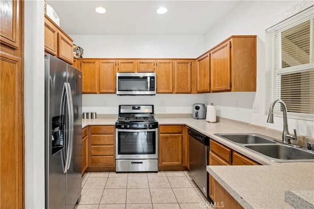 26396 Arboretum Way Unit 2901, Murrieta, CA 92563 - kitchen featuring stainless steel appliances, brown cabinetry, light countertops, light tile patterned floors, and recessed lighting