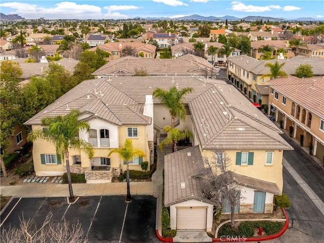 aerial view featuring a mountain view and a residential view