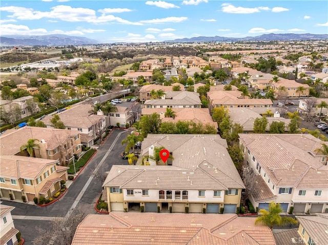 birds eye view of property featuring a residential view and a mountain view