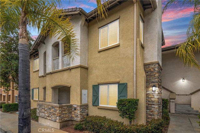 26396 Arboretum Way Unit 2901, Murrieta, CA 92563 - view of front facade featuring stucco siding and stone siding