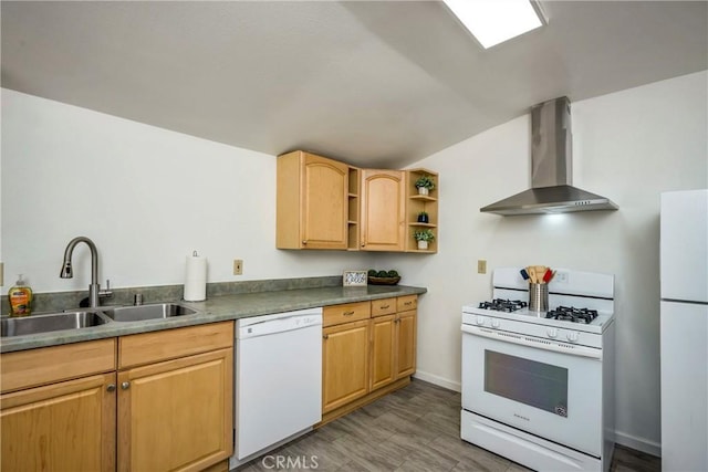 kitchen featuring light brown cabinets, white appliances, a sink, wall chimney range hood, and open shelves