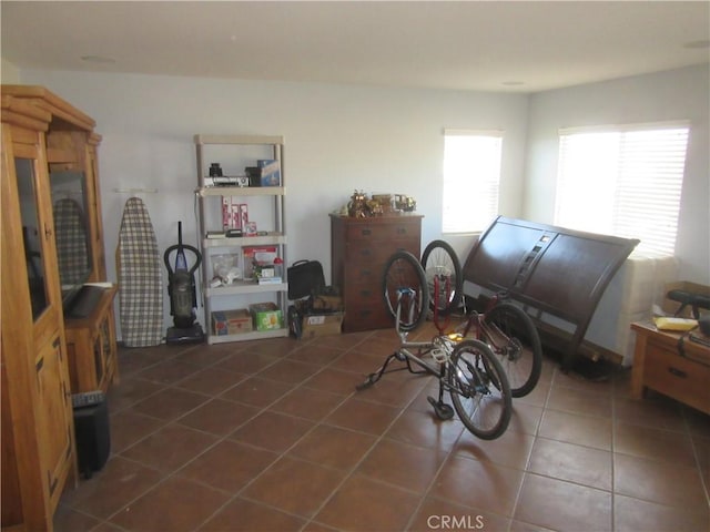 misc room with tile patterned flooring