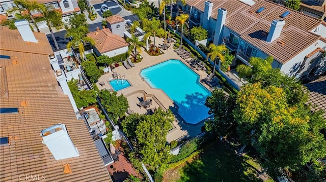 birds eye view of property with a residential view