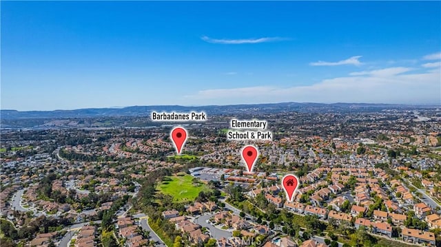 aerial view featuring a mountain view and a residential view