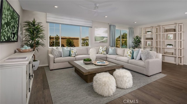 living area featuring dark wood finished floors and recessed lighting