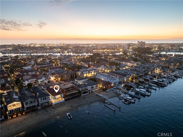 aerial view with a water view and a city view