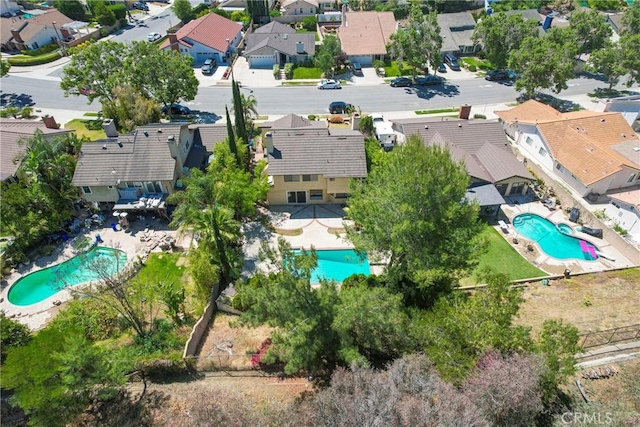 49 Village Loop Rd, Pomona, CA 91766 - aerial view of residential area featuring a pool area
