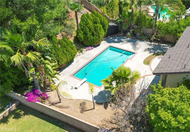 49 Village Loop Rd, Pomona, CA 91766 - view of pool featuring a fenced backyard, a patio, and a diving board
