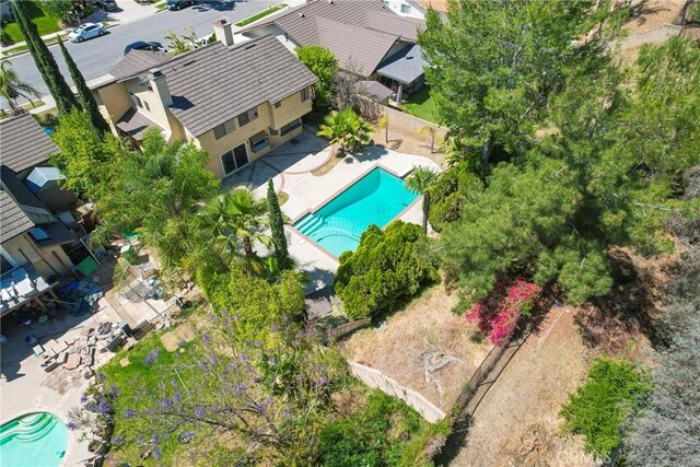 49 Village Loop Rd, Pomona, CA 91766 - view from above of property featuring a pool
