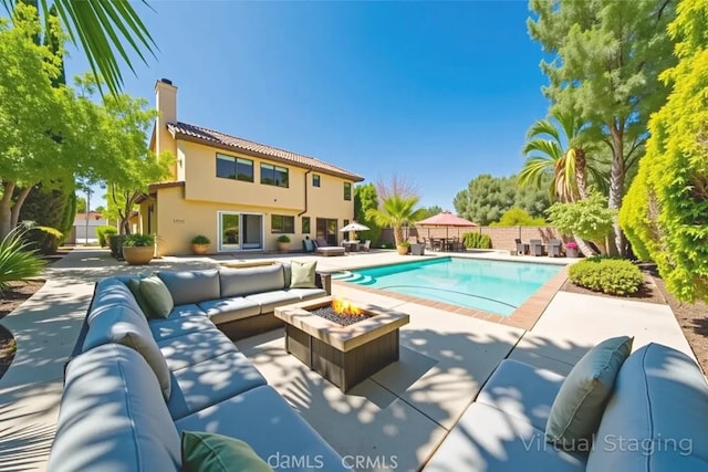49 Village Loop Rd, Pomona, CA 91766 - view of pool featuring an outdoor living space with a fire pit and a patio area