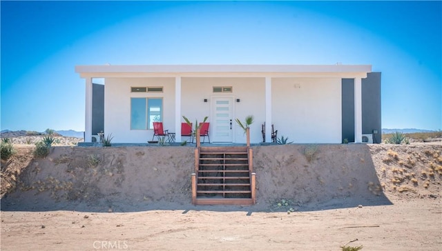 view of front of home featuring stucco siding