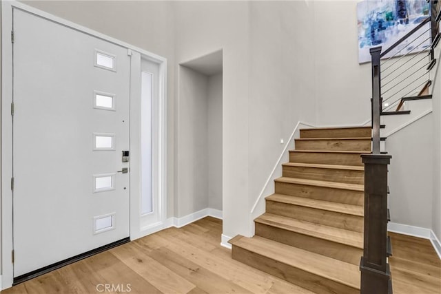 58 Sagan Way, Irvine, CA 92618 - foyer with stairs, baseboards, and wood finished floors
