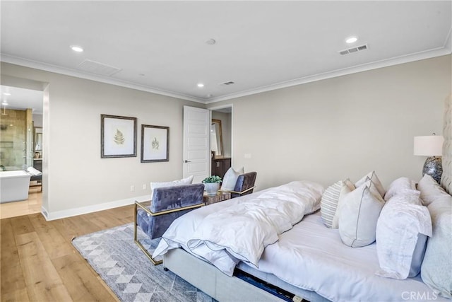 58 Sagan Way, Irvine, CA 92618 - bedroom featuring light wood finished floors, recessed lighting, baseboards, crown molding, and connected bathroom