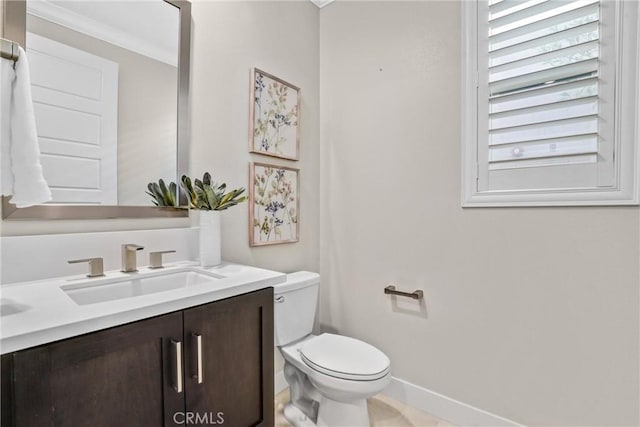 58 Sagan Way, Irvine, CA 92618 - bathroom featuring toilet, vanity, baseboards, and crown molding