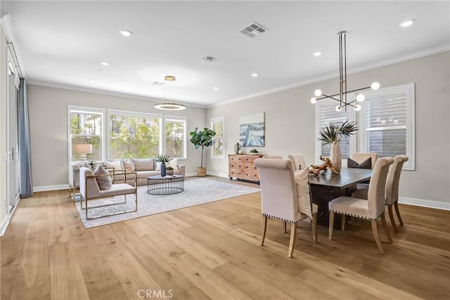 dining space featuring recessed lighting, visible vents, light wood-style floors, ornamental molding, and baseboards