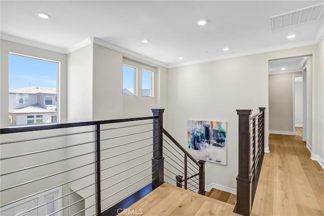 58 Sagan Way, Irvine, CA 92618 - hall featuring an upstairs landing, baseboards, wood finished floors, ornamental molding, and recessed lighting