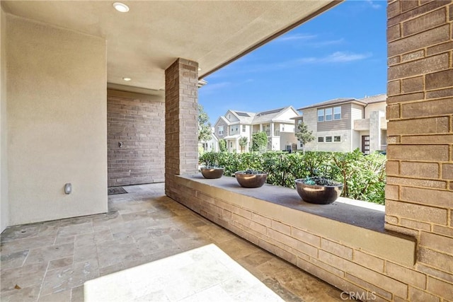 view of patio with a residential view