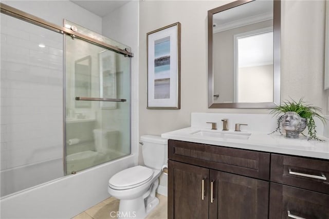 bathroom with enclosed tub / shower combo, toilet, vanity, ornamental molding, and tile patterned floors