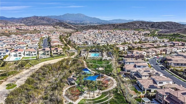 bird's eye view with a residential view and a mountain view