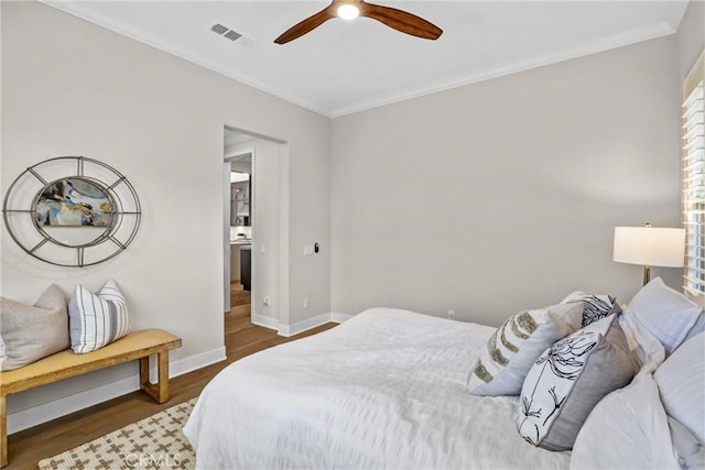 58 Sagan Way, Irvine, CA 92618 - bedroom featuring wood finished floors, baseboards, crown molding, and ceiling fan