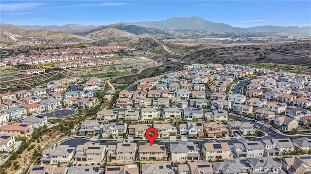 aerial view featuring a residential view and a mountain view